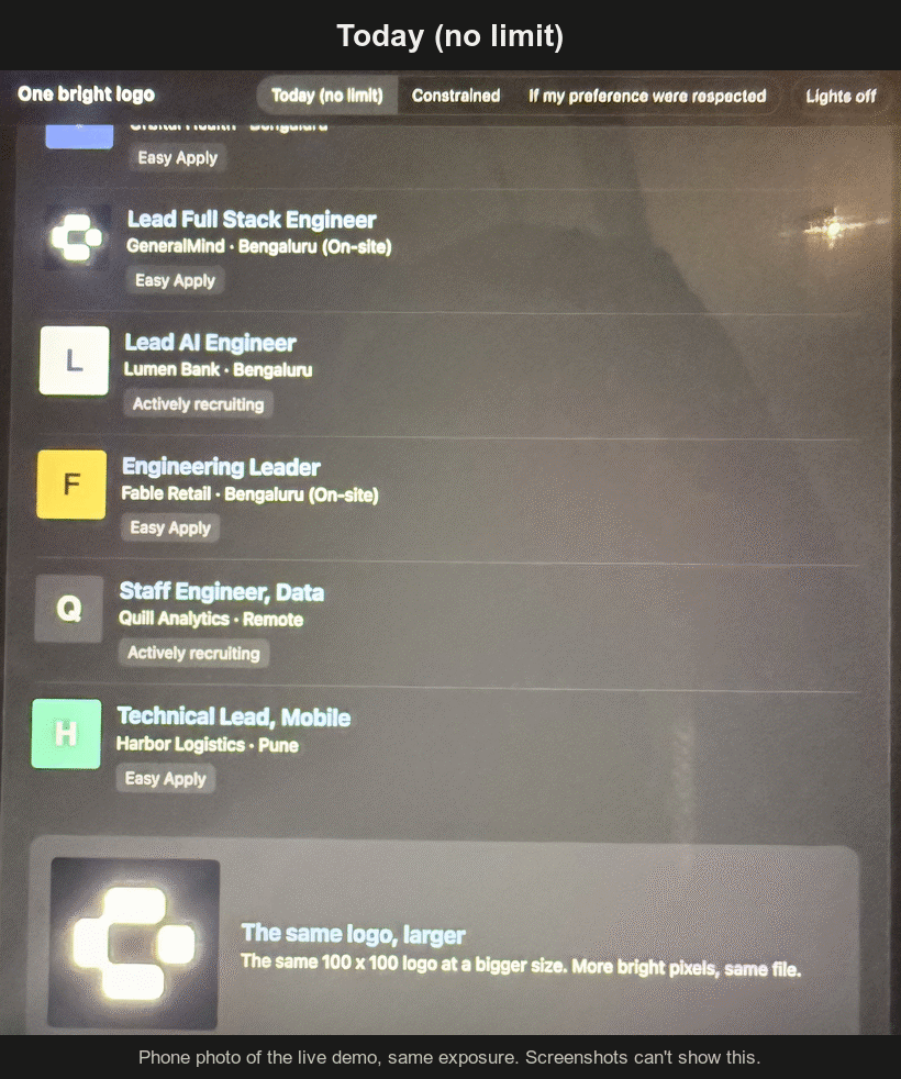 Phone photos of the demo inbox: the logo glowing far brighter than the page, then the same logo matching the page when the preference is respected.